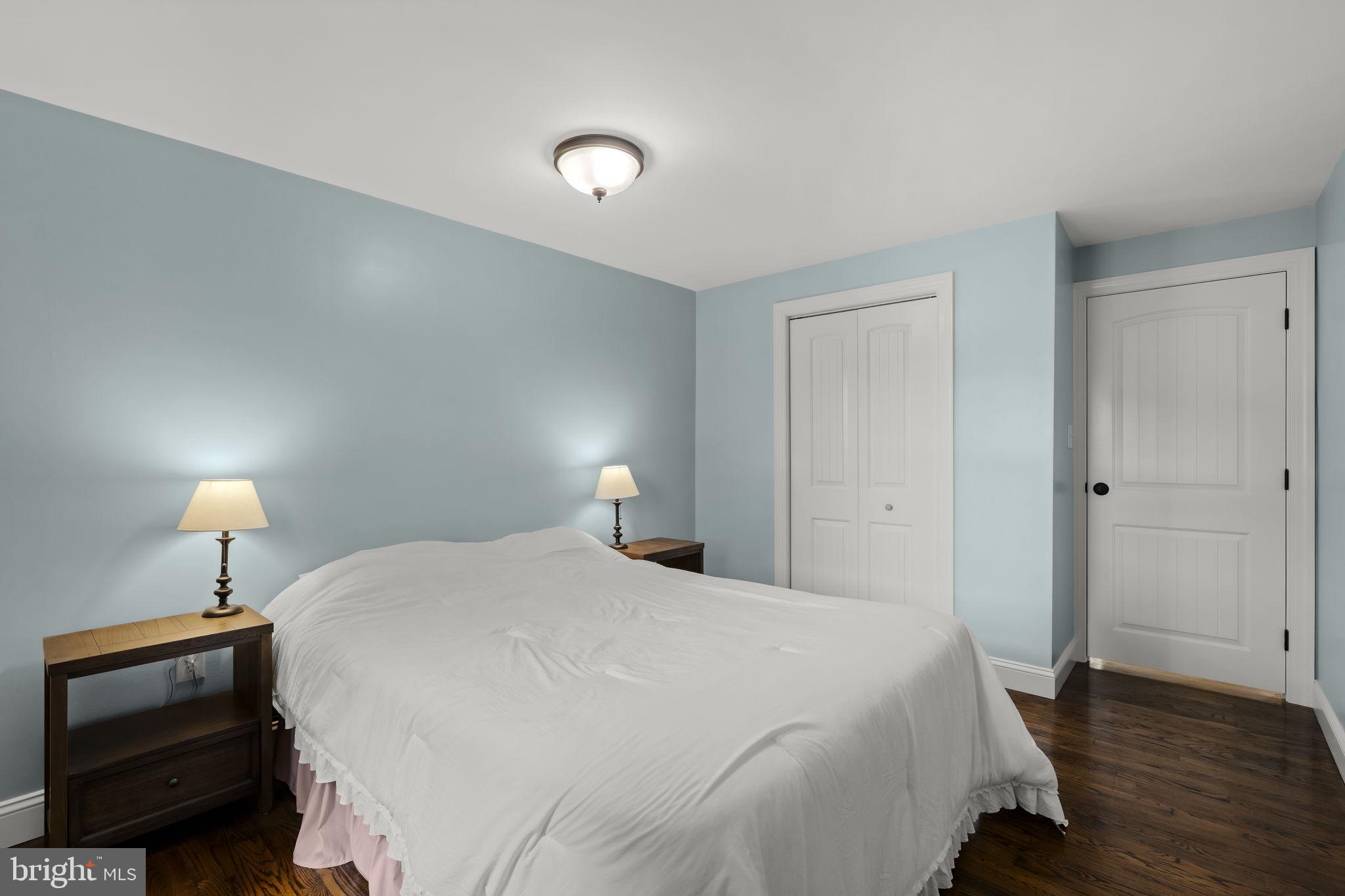 1160 Narvon Road Narvon, PA 17555 - Photo 38 of 64 a bedroom with a bed and a lamp on desk