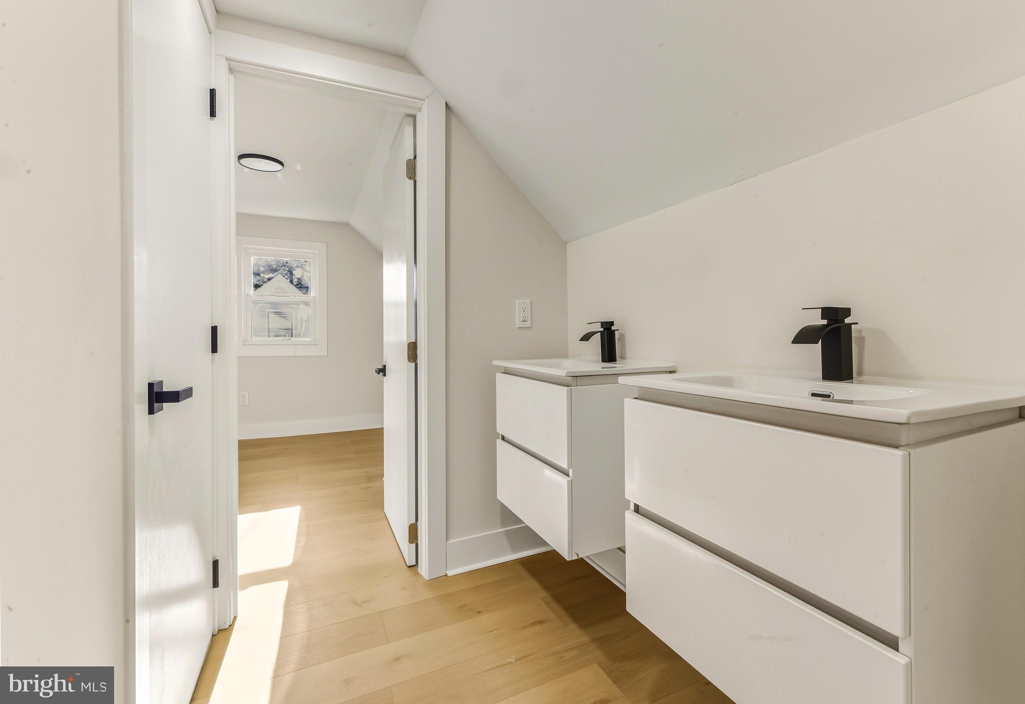 12 Cloverdale Road Blackwood, NJ 08012 - Photo 12 of 17 a bathroom with a sink and a mirror