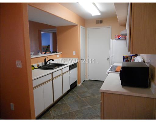 2300 East Silverado Ranch Boulevard, Unit 2049 Las Vegas, NV 89123 - Photo 4 of 12 Kitchen.