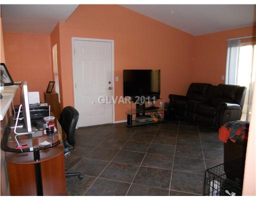2300 East Silverado Ranch Boulevard, Unit 2049 Las Vegas, NV 89123 - Photo 9 of 12 Living Room.