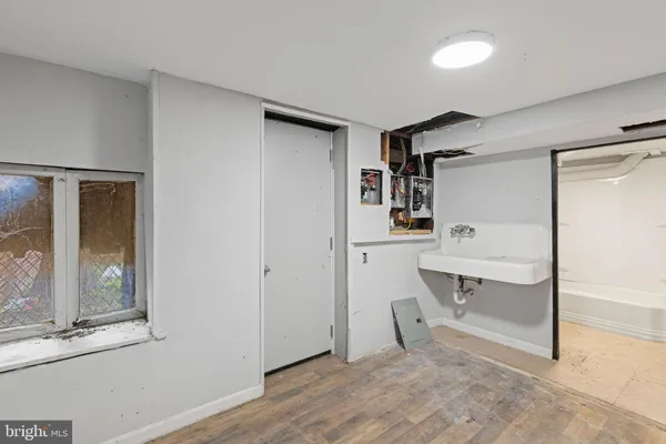 a bathroom with a sink toilet and vanity