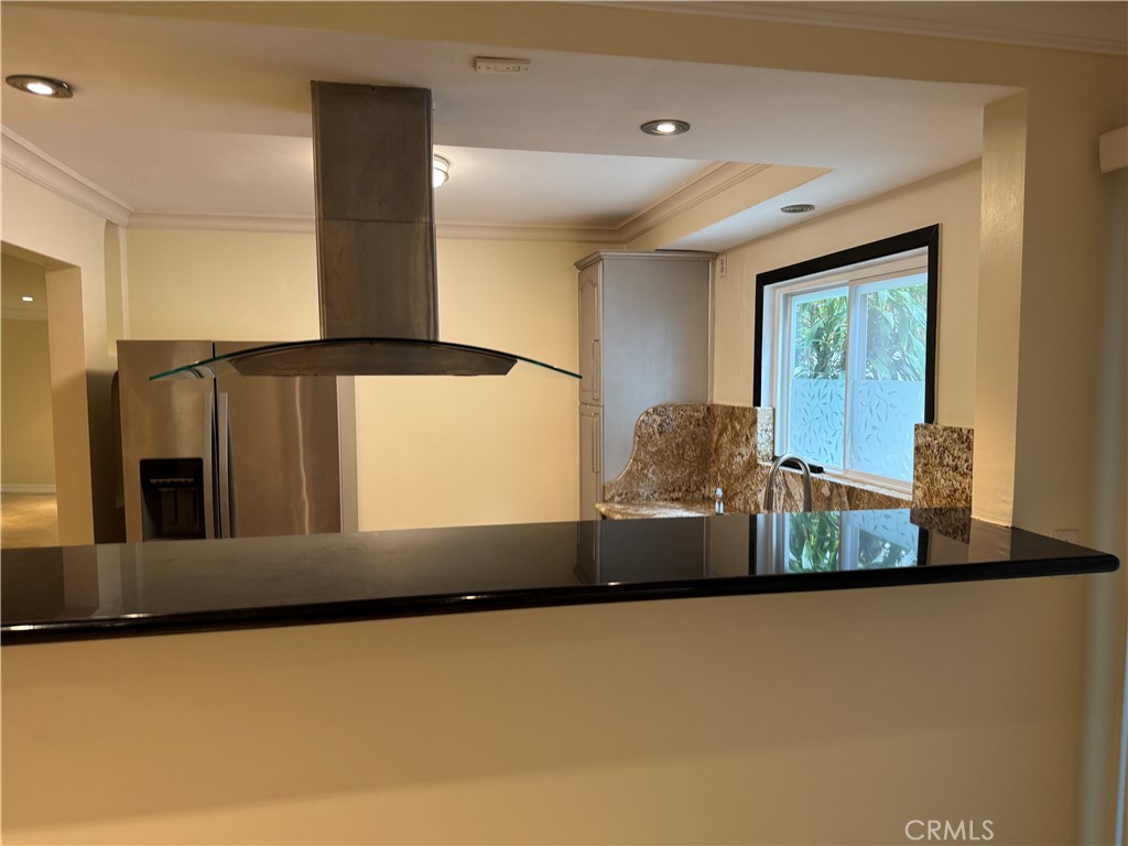 11370 Sunset Boulevard, Unit B Los Angeles, CA 90049 - Photo 22 of 27 a view of a living room with a large window