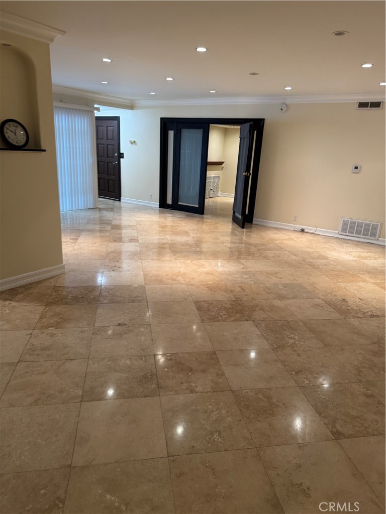 11370 Sunset Boulevard, Unit B Los Angeles, CA 90049 - Photo 23 of 27 a view of a livingroom with a staircase