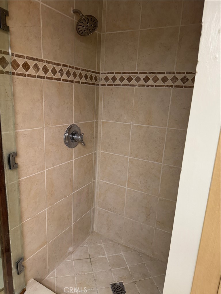 11370 Sunset Boulevard, Unit B Los Angeles, CA 90049 - Photo 24 of 27 a bathroom with a shower