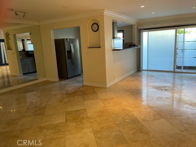 11370 Sunset Boulevard, Unit B Los Angeles, CA 90049 - Photo 5 of 27 a view of a hallway with wooden shelves