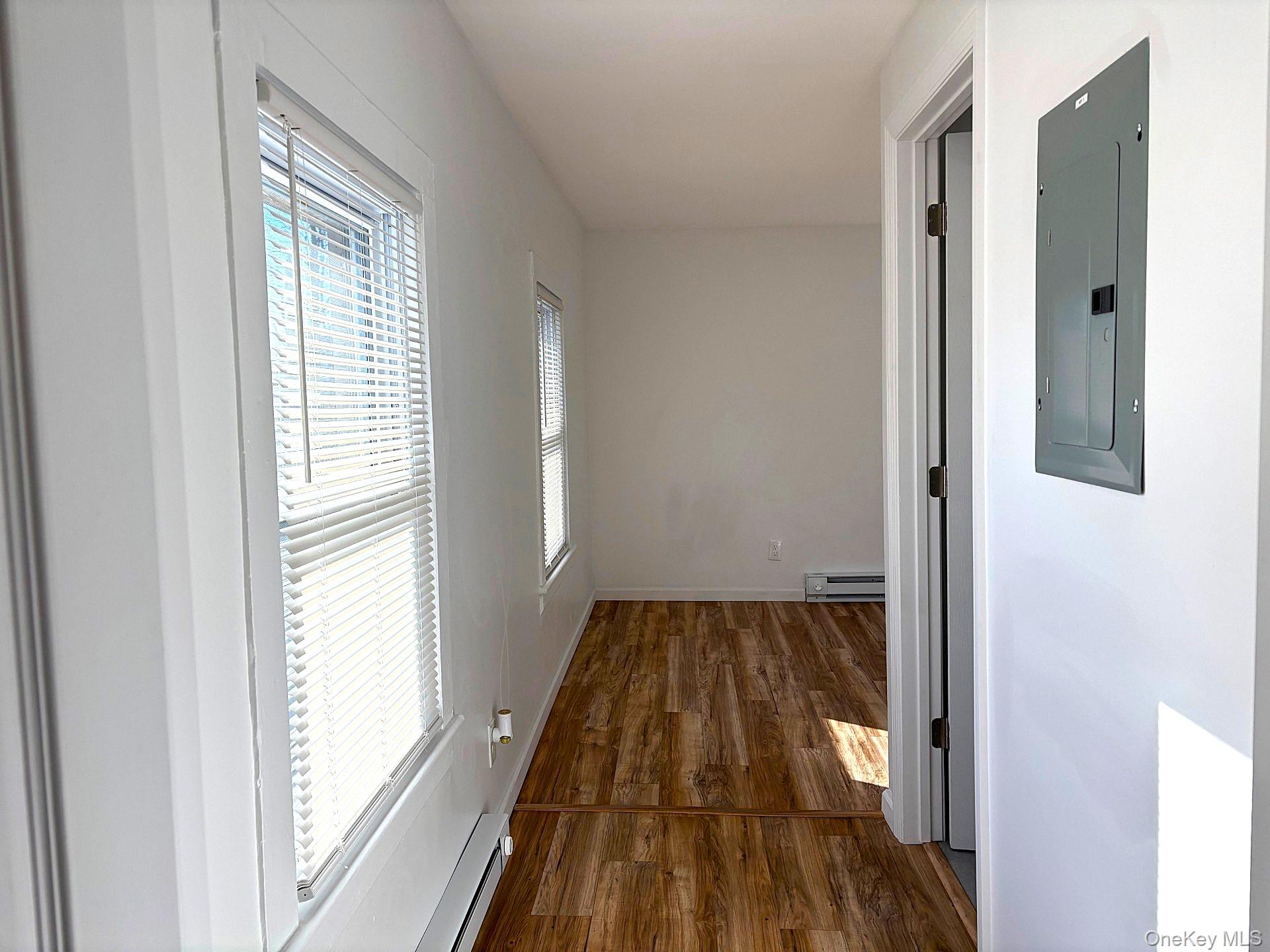 447 Highway 376, Unit 1 Hopewell Junction, NY 12533 - Photo 13 of 18 a view of a bedroom from a window