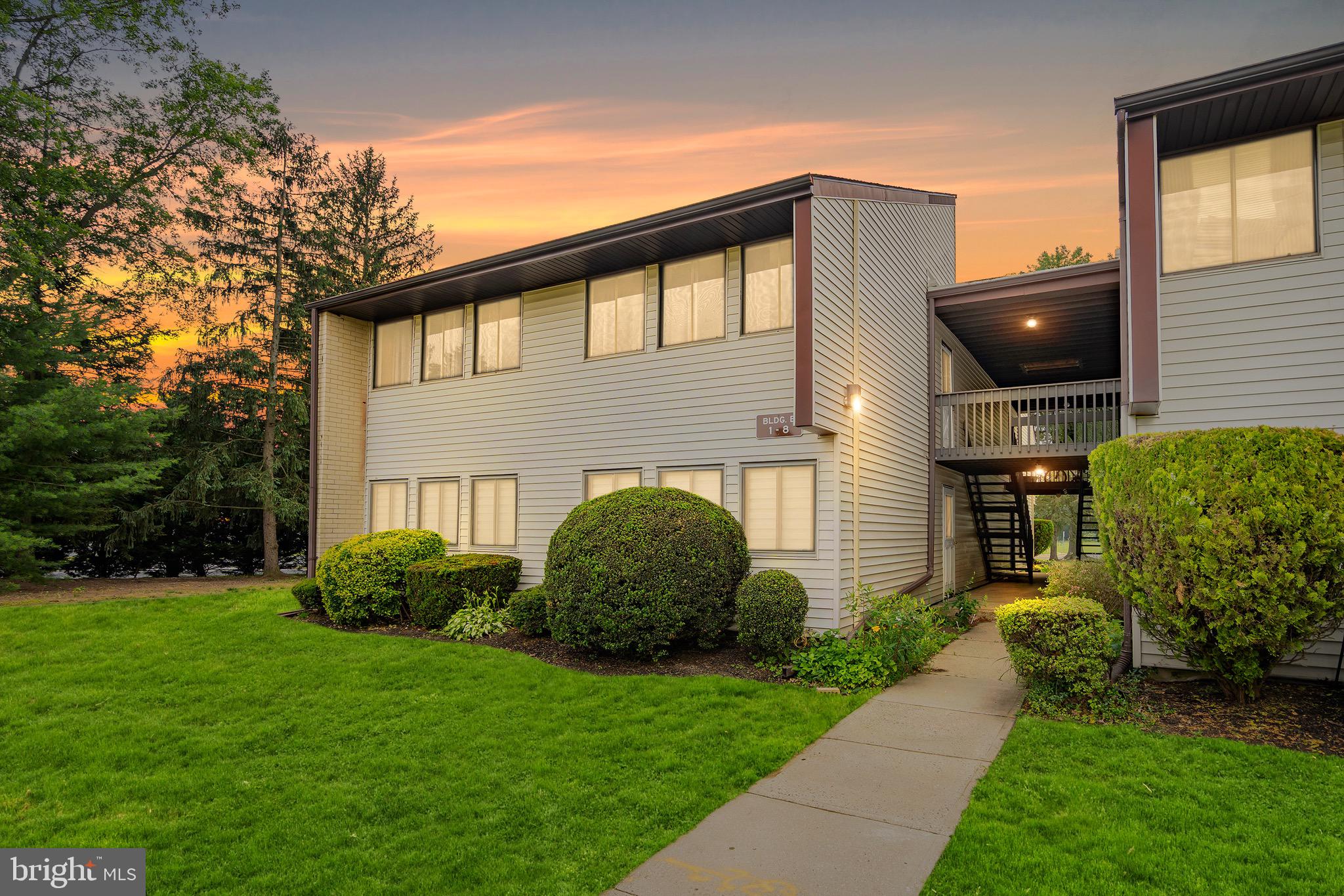 2 Avon Drive Hightstown, NJ 08520 - Photo 1 of 27 a front view of a house with garden