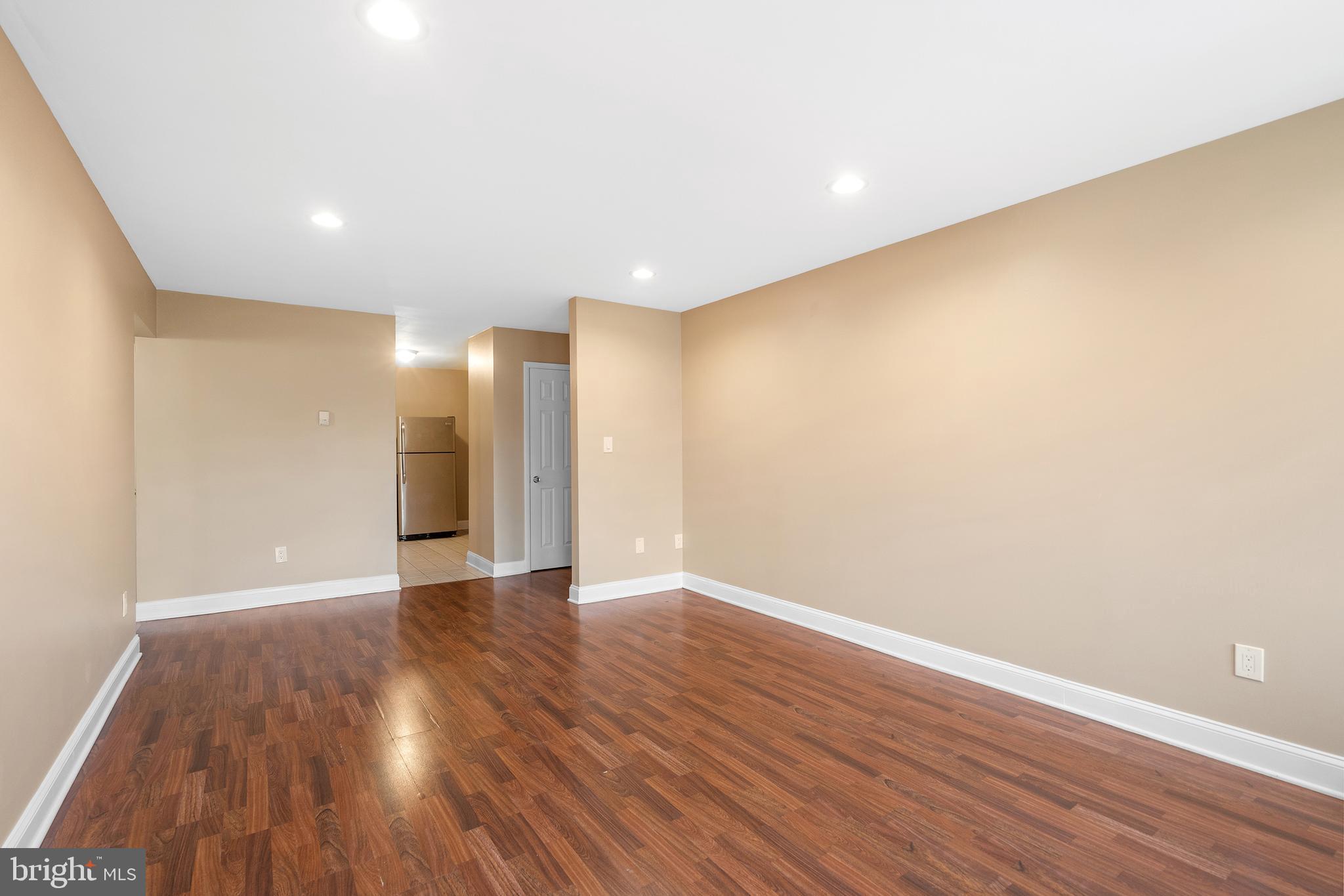 2 Avon Drive Hightstown, NJ 08520 - Photo 3 of 27 a view of an empty room with wooden floor
