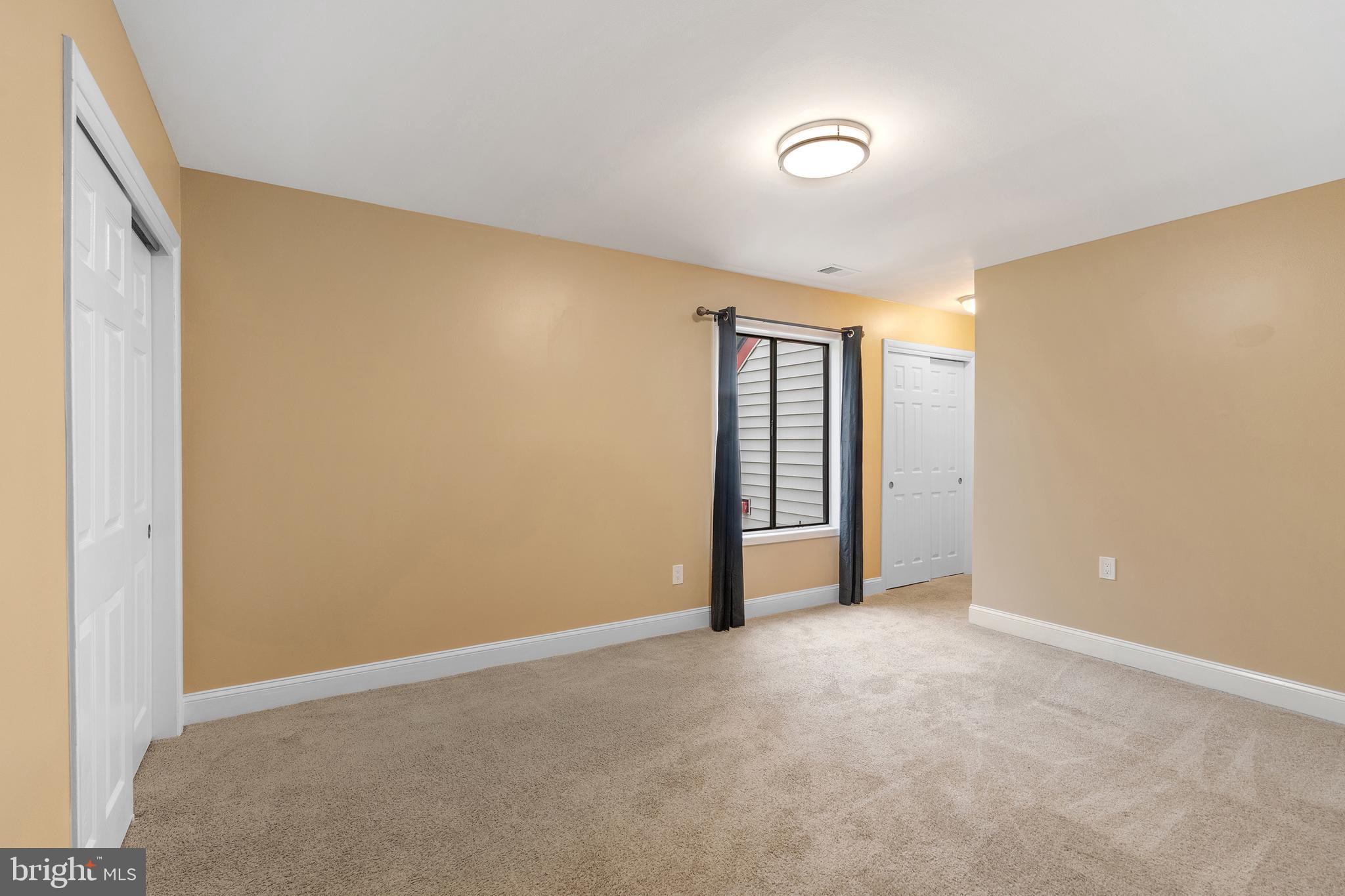 2 Avon Drive Hightstown, NJ 08520 - Photo 8 of 27 a view of an empty room with a window