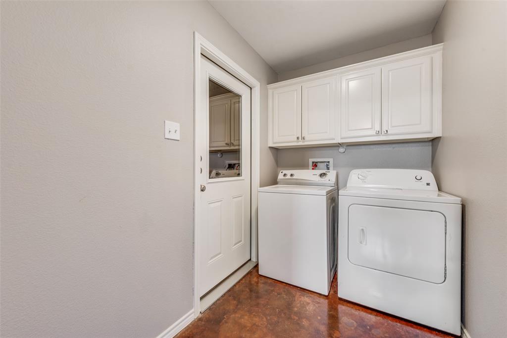 309 East 2nd Street Maypearl, TX 76064 - Photo 7 of 20 a utility room with dryer and washer