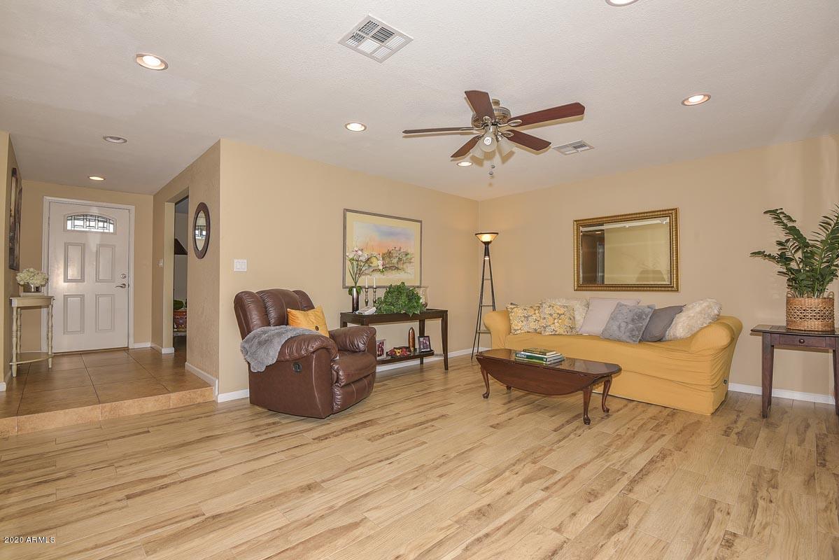 3521 West Griswold Road Phoenix, AZ 85051 - Photo 3 of 23 Griswold Living Room 1