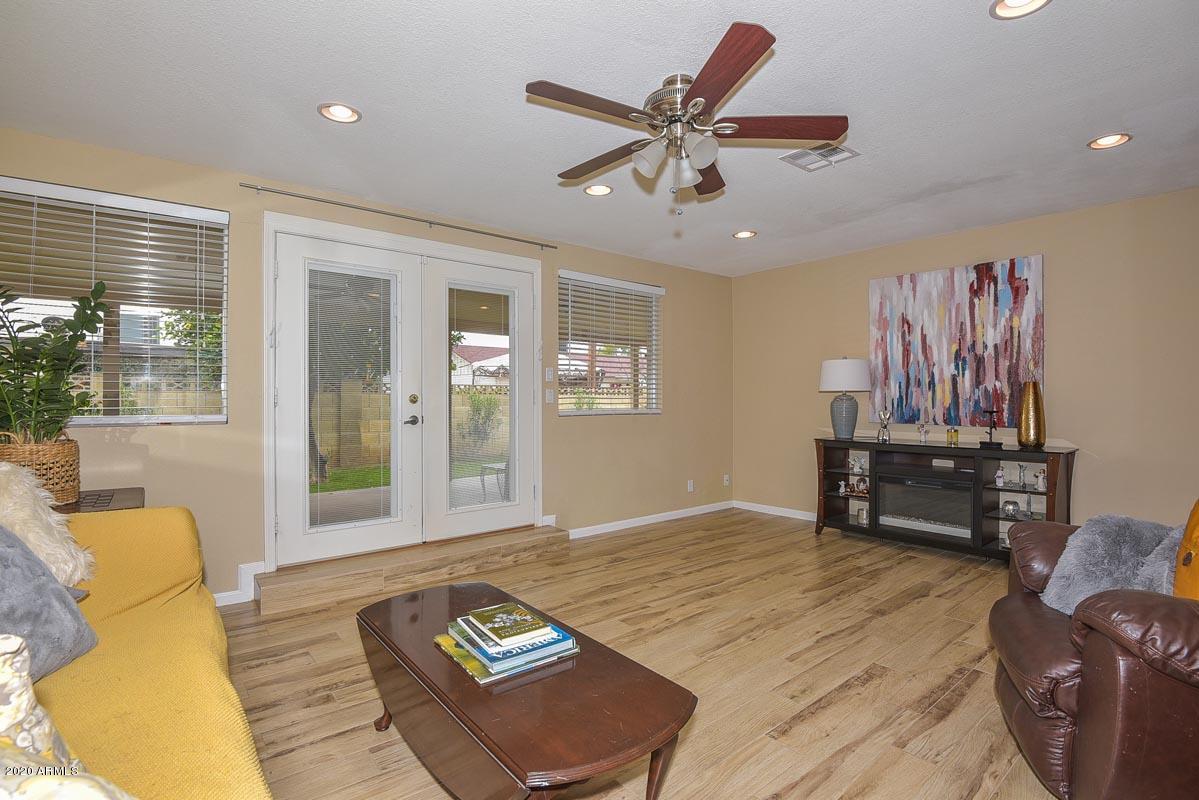 3521 West Griswold Road Phoenix, AZ 85051 - Photo 4 of 23 Griswold Living Room 2