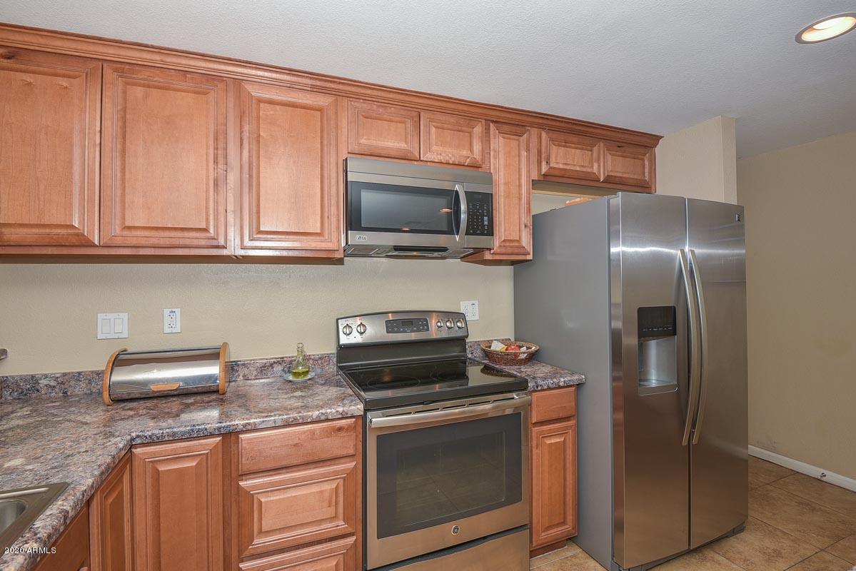 3521 West Griswold Road Phoenix, AZ 85051 - Photo 7 of 23 Griswold Kitchen 2