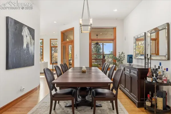a kitchen with granite countertop stainless steel appliances window and cabinets