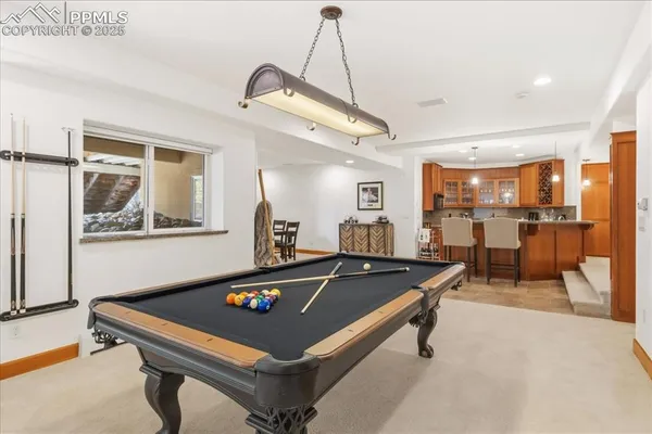 a living room with furniture and a table