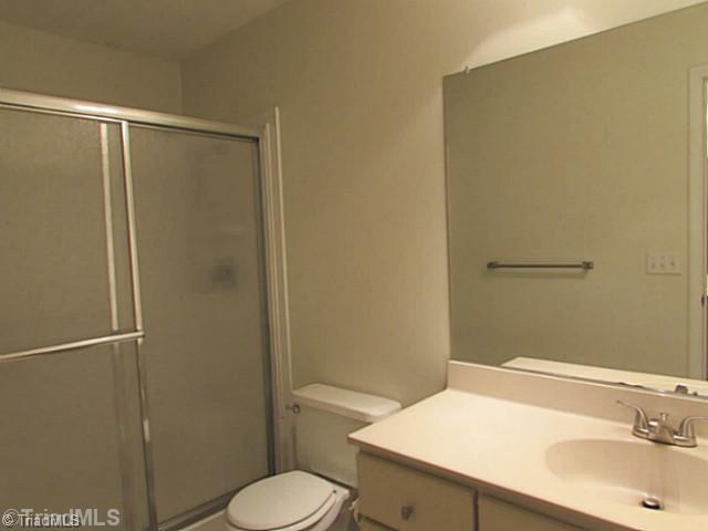 155 Old Mill Road High Point, NC 27265 - Photo 11 of 16 Master Bath/Spa. Shower/tub and his sink/vanity are separate from hers.