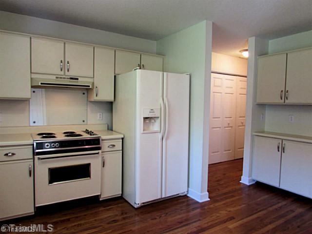 155 Old Mill Road High Point, NC 27265 - Photo 6 of 16 Kitchen. Spacious kitchen has a whole wall of cabinets and enough room for a small eat-in area.