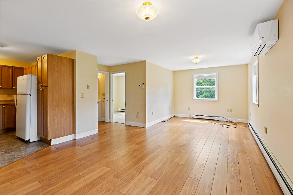 2525 West River Road Sidney, ME 04330 - Photo 18 of 41 Living room leads to kitchen