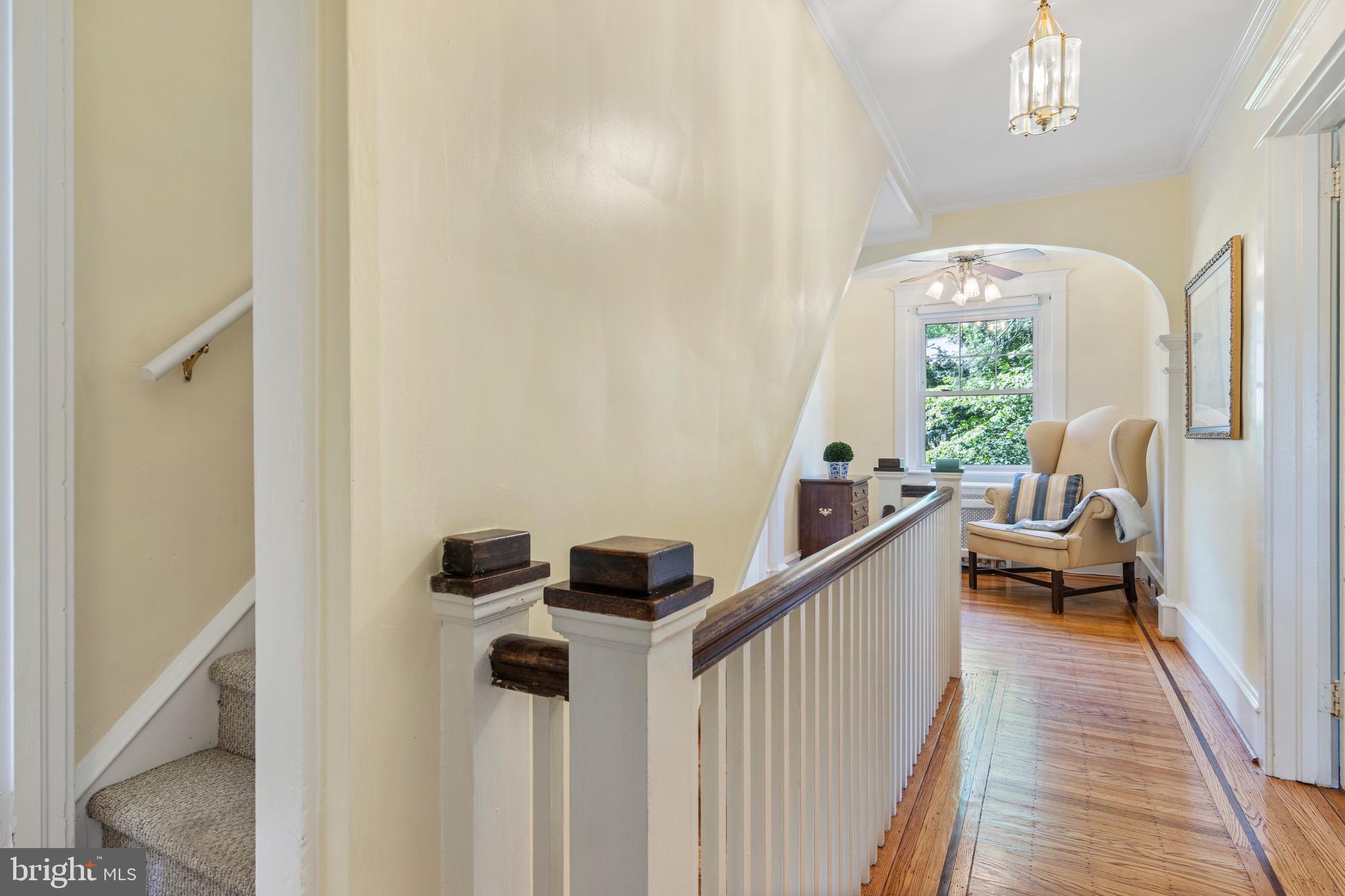 416 Waverly Road Wyncote, PA 19095 - Photo 28 of 67 a view of a hallway to a livingroom with wooden floor and windows