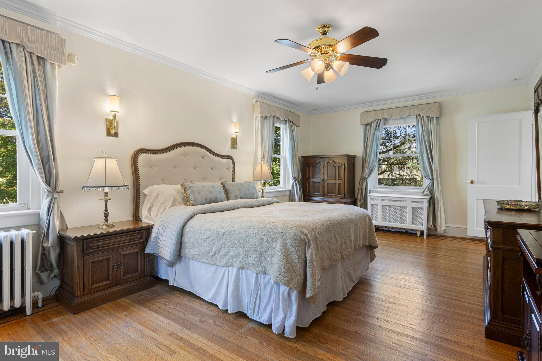 416 Waverly Road Wyncote, PA 19095 - Photo 30 of 67 a bedroom with a bed and wooden floor