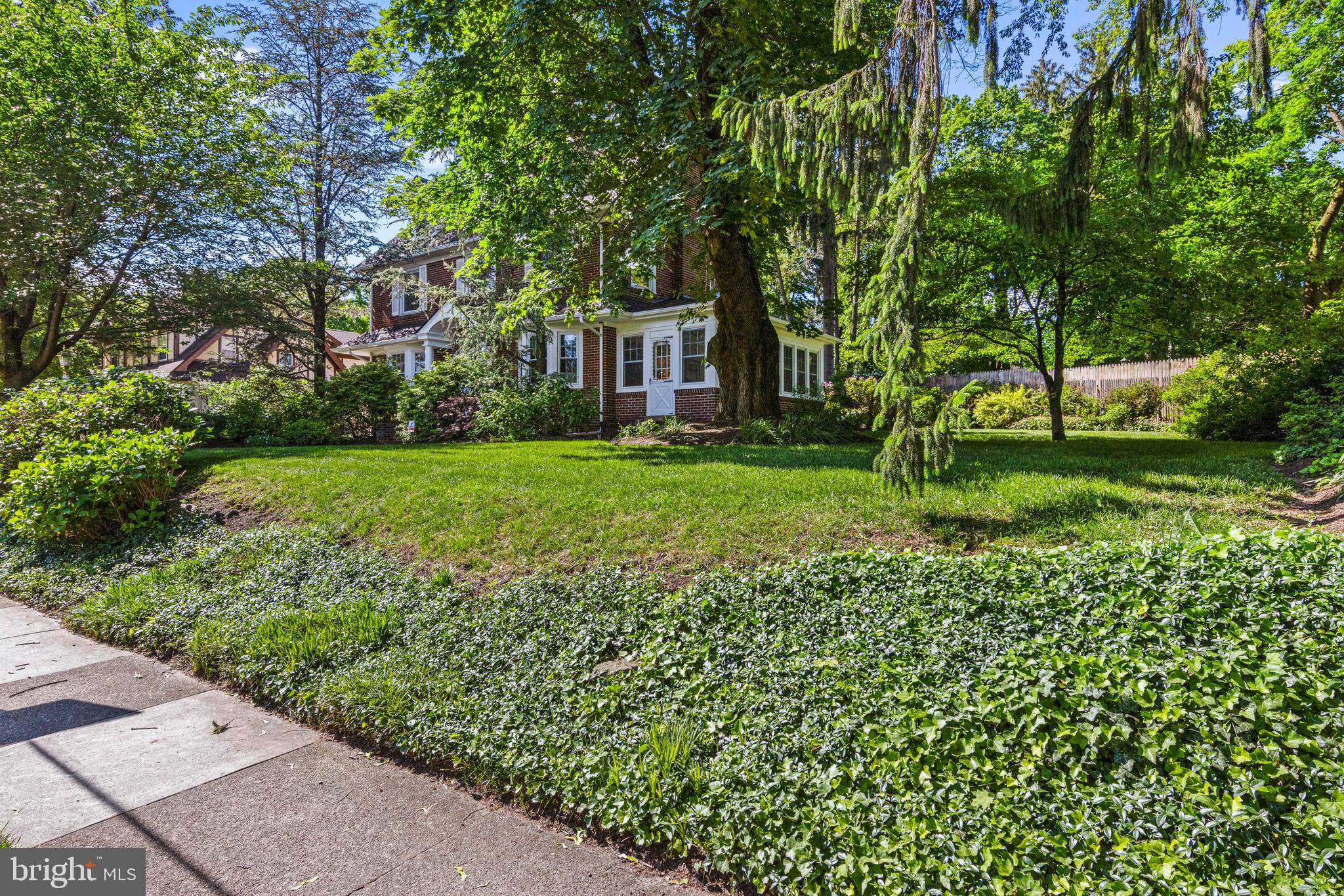 416 Waverly Road Wyncote, PA 19095 - Photo 3 of 67 a view of a garden with a tree