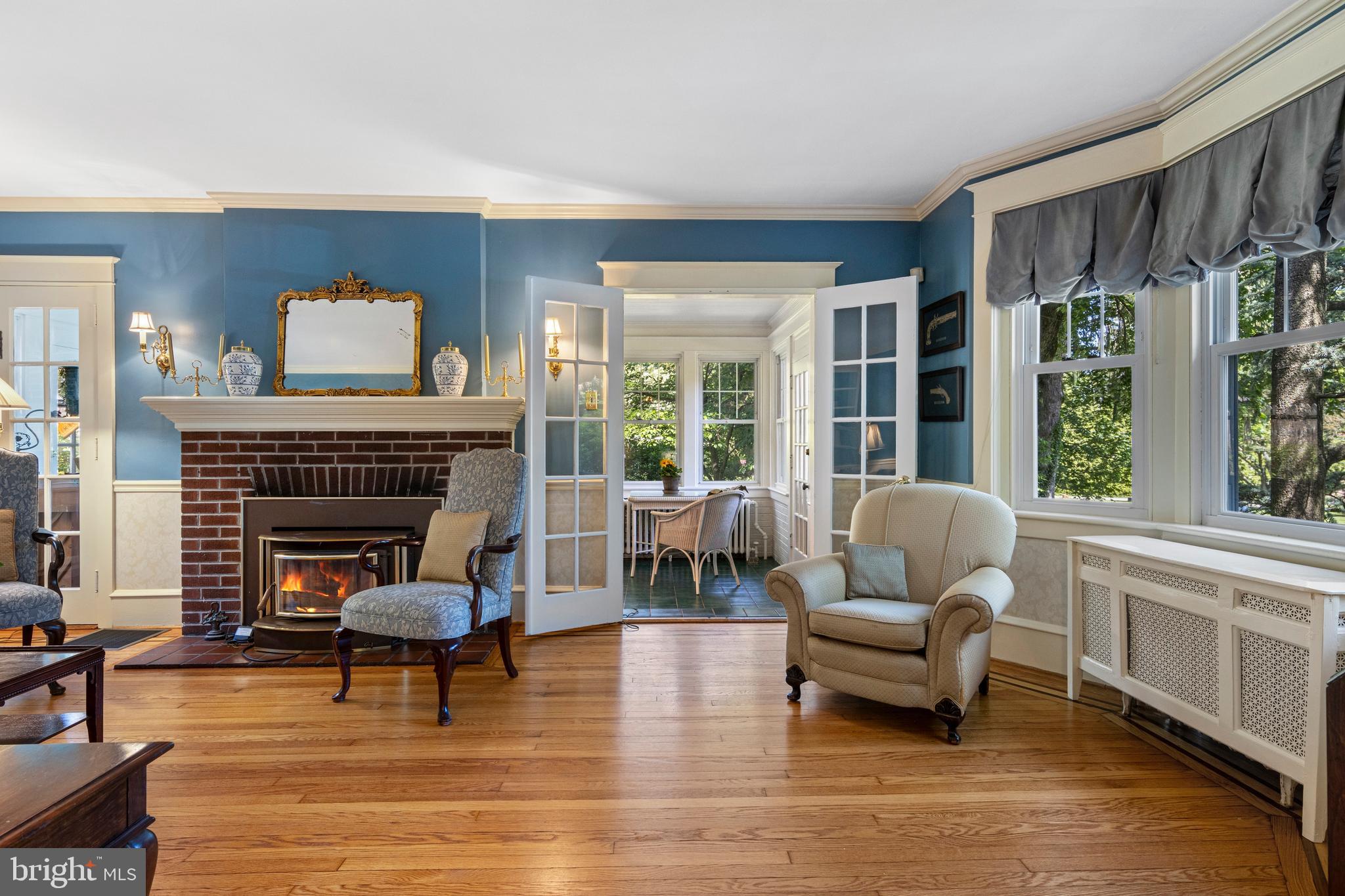416 Waverly Road Wyncote, PA 19095 - Photo 9 of 67 a living room with furniture and a fireplace