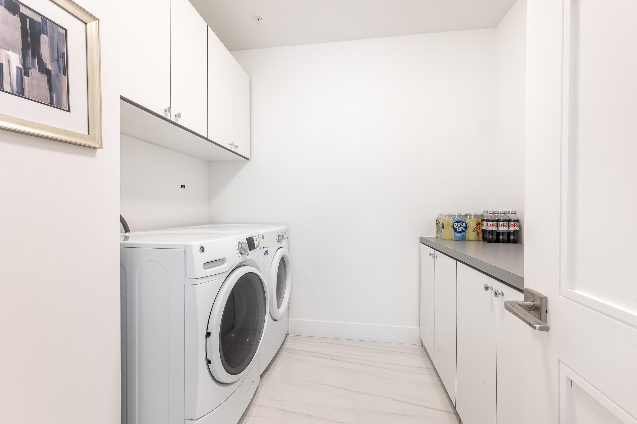 155 East Boca Raton Road, Unit 614 Boca Raton, FL 33432 - Photo 27 of 55 a utility room with dryer and washer