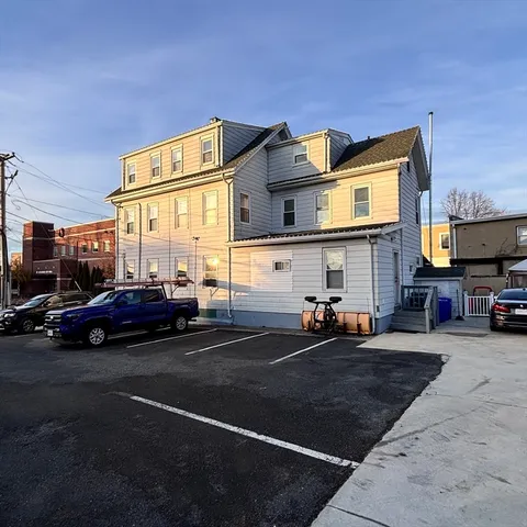 a cars parked in front of a building
