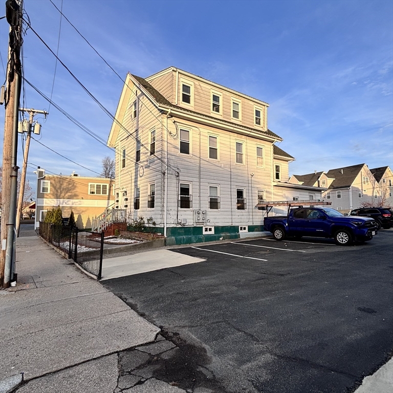 12 Pine Street, Unit 2 Attleboro, MA 02703 - Photo 20 of 20 a large building with a view of car parked