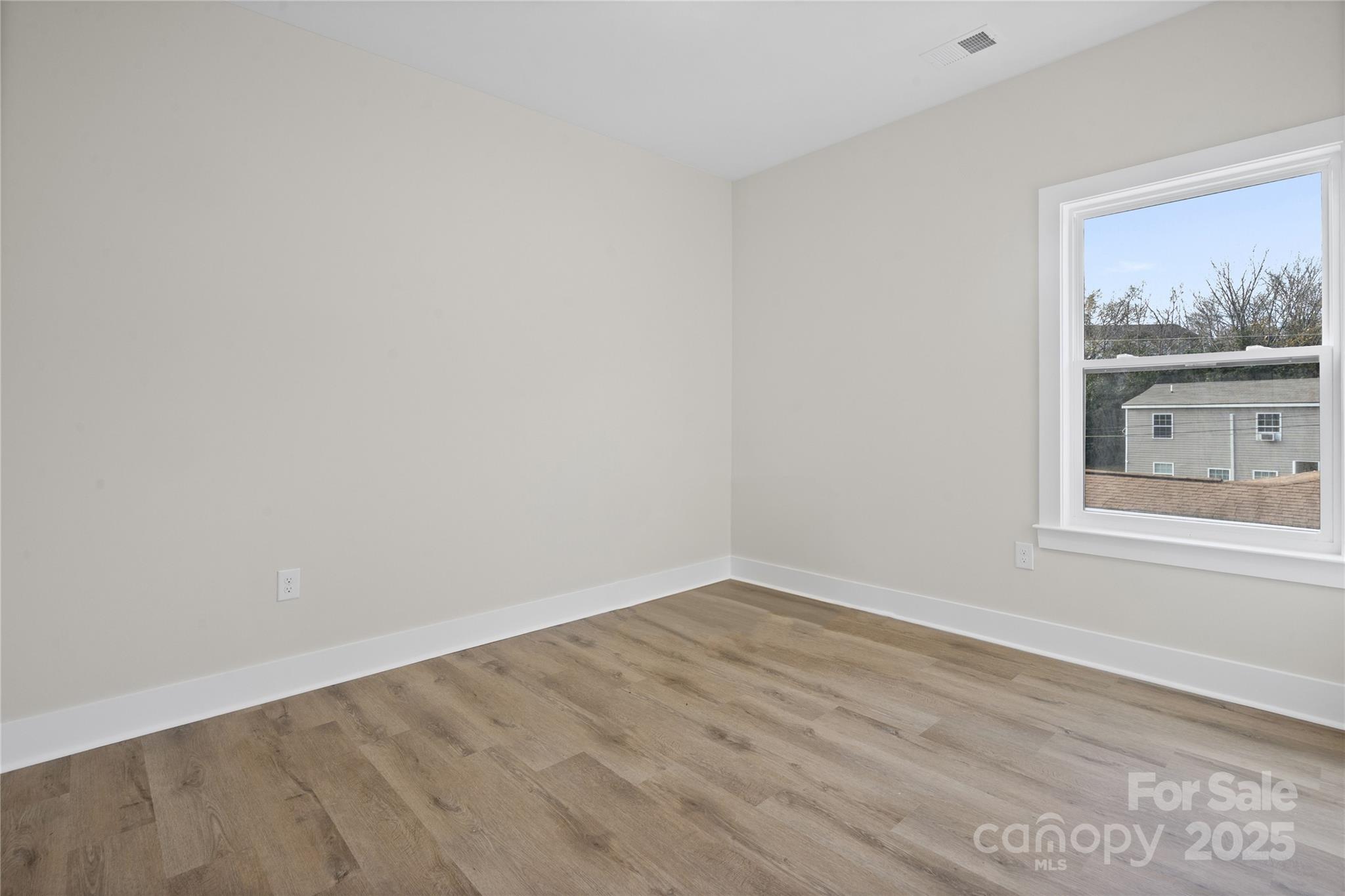 241 Booker Drive Southwest Concord, NC 28025 - Photo 17 of 29 a view of an empty room with a window