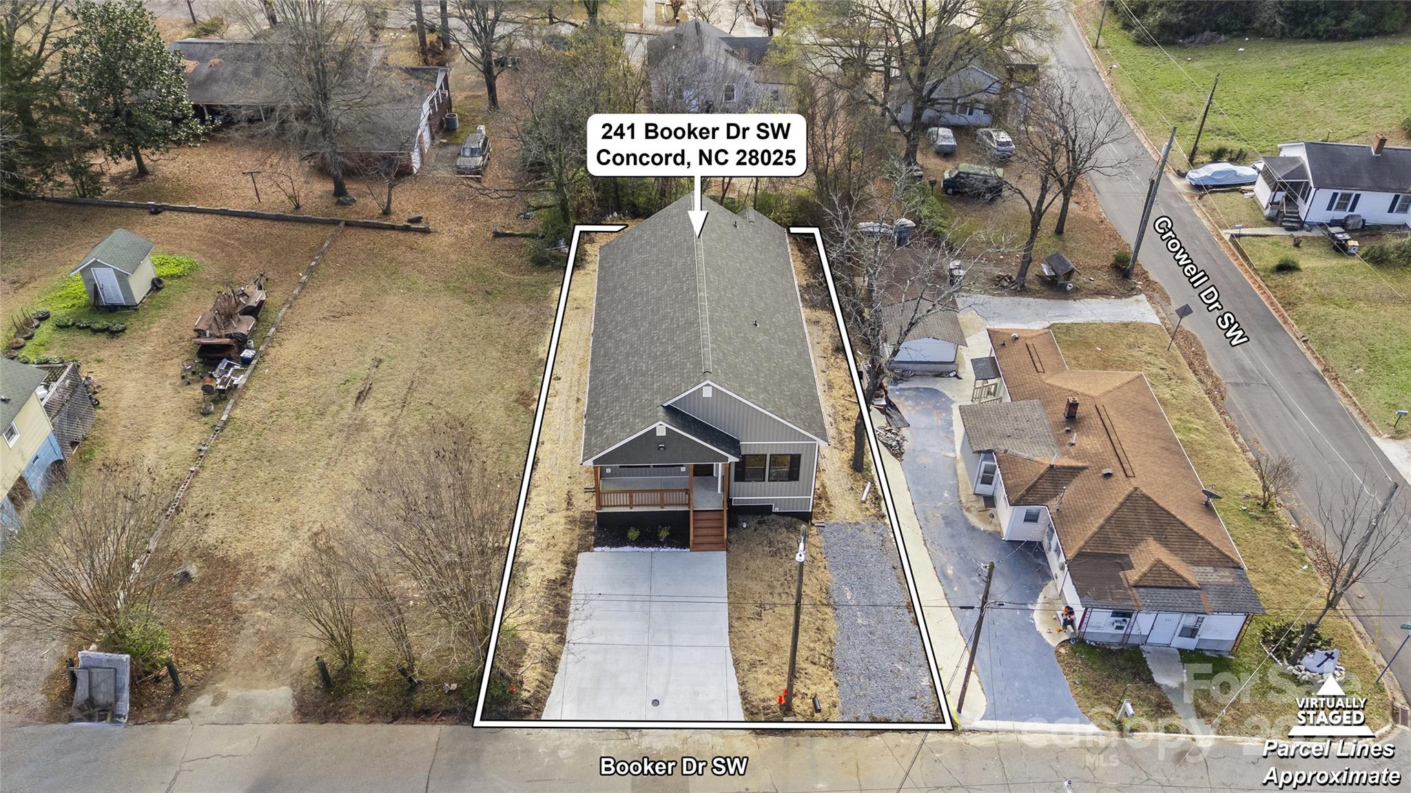 241 Booker Drive Southwest Concord, NC 28025 - Photo 26 of 29 an aerial view of a house with outdoor space