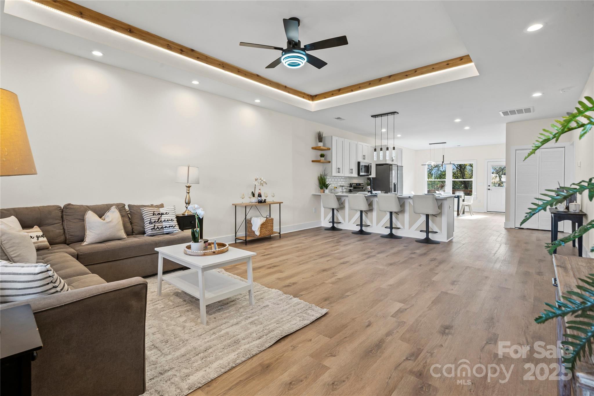 241 Booker Drive Southwest Concord, NC 28025 - Photo 6 of 29 a living room with furniture and white walls