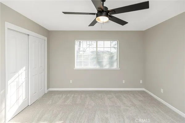 a view of empty room with windows