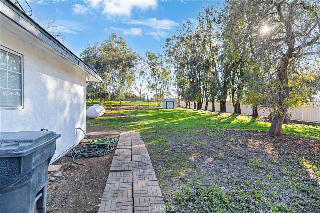 28702 Rancho Avenue Madera, CA 93638 - Photo 30 of 34 a view of a backyard with garden