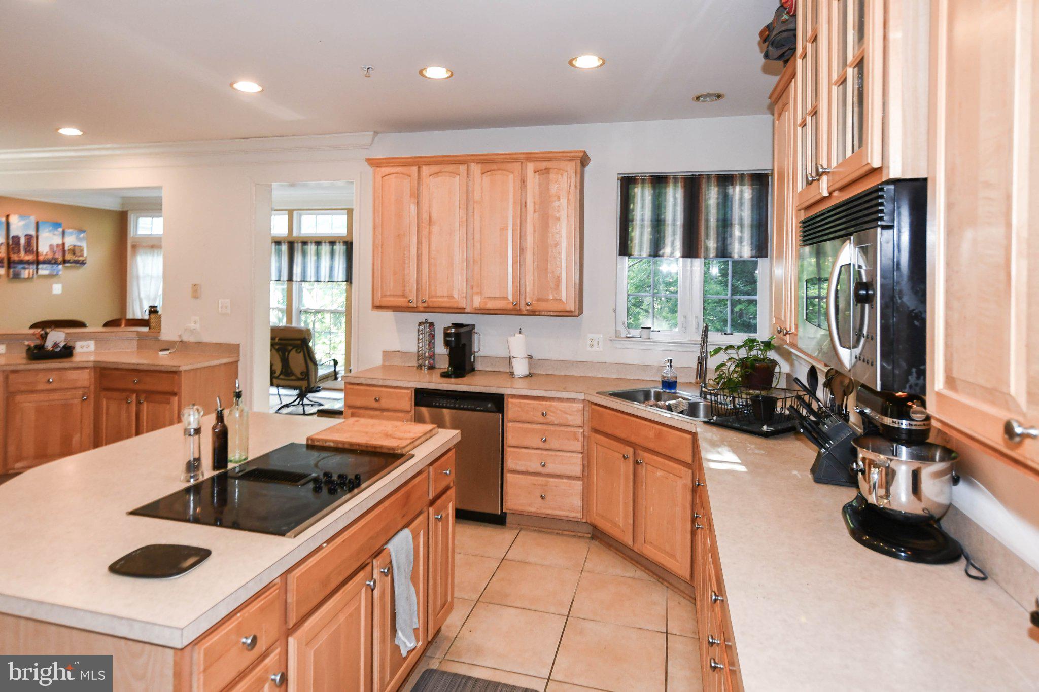 3208 Clavier Place Clinton, MD 20735 - Photo 21 of 55 Inviting kitchen with warm wood tones.