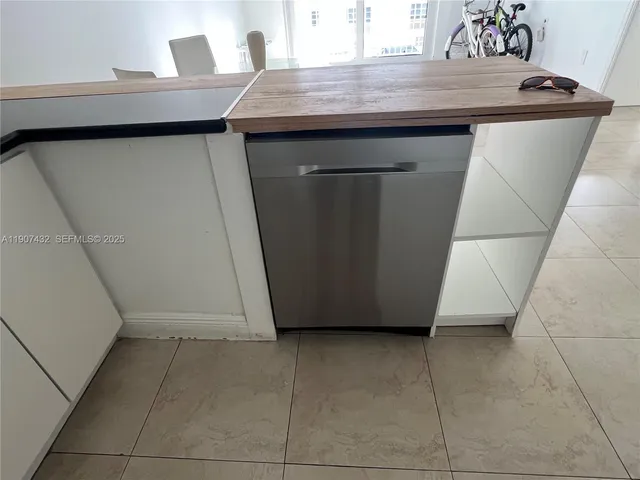 a utility room with washer and dryer