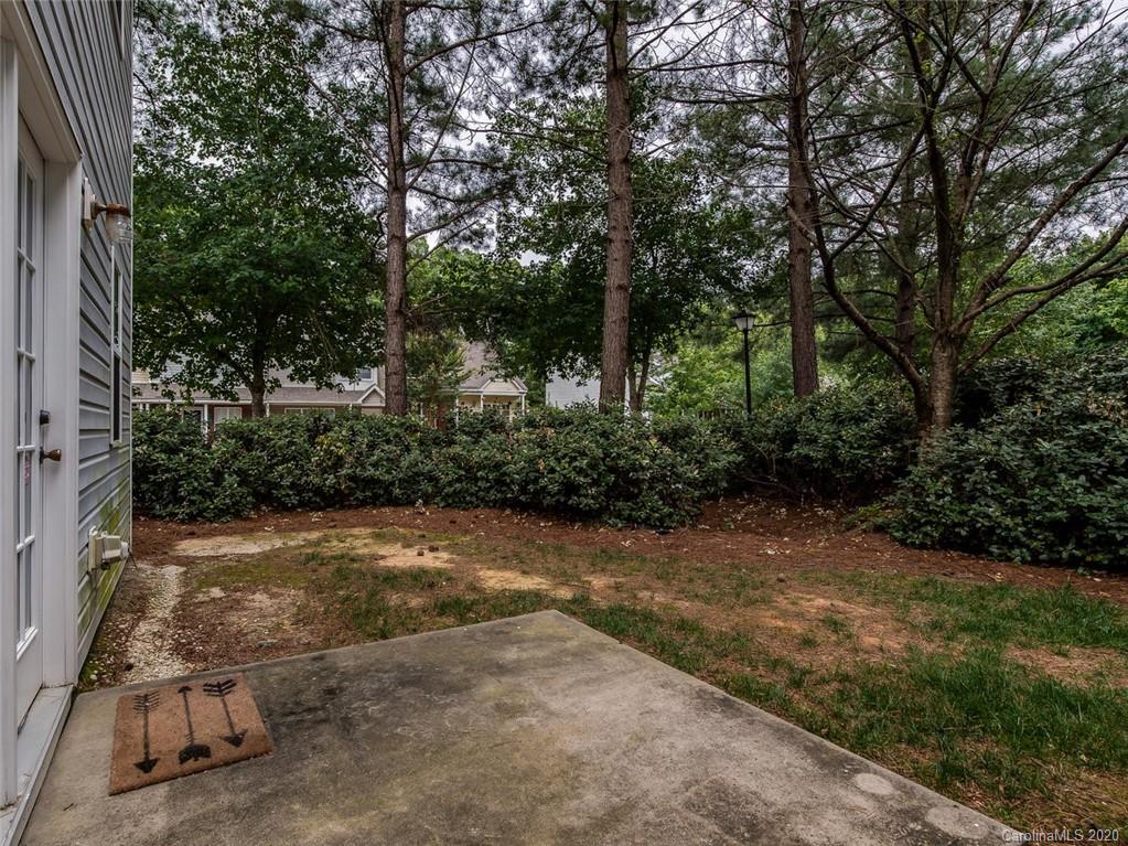 8376 Rudolph Road Charlotte, NC 28216 - Photo 15 of 17 a view of backyard with green space