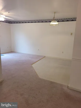 a view of a room with an empty space