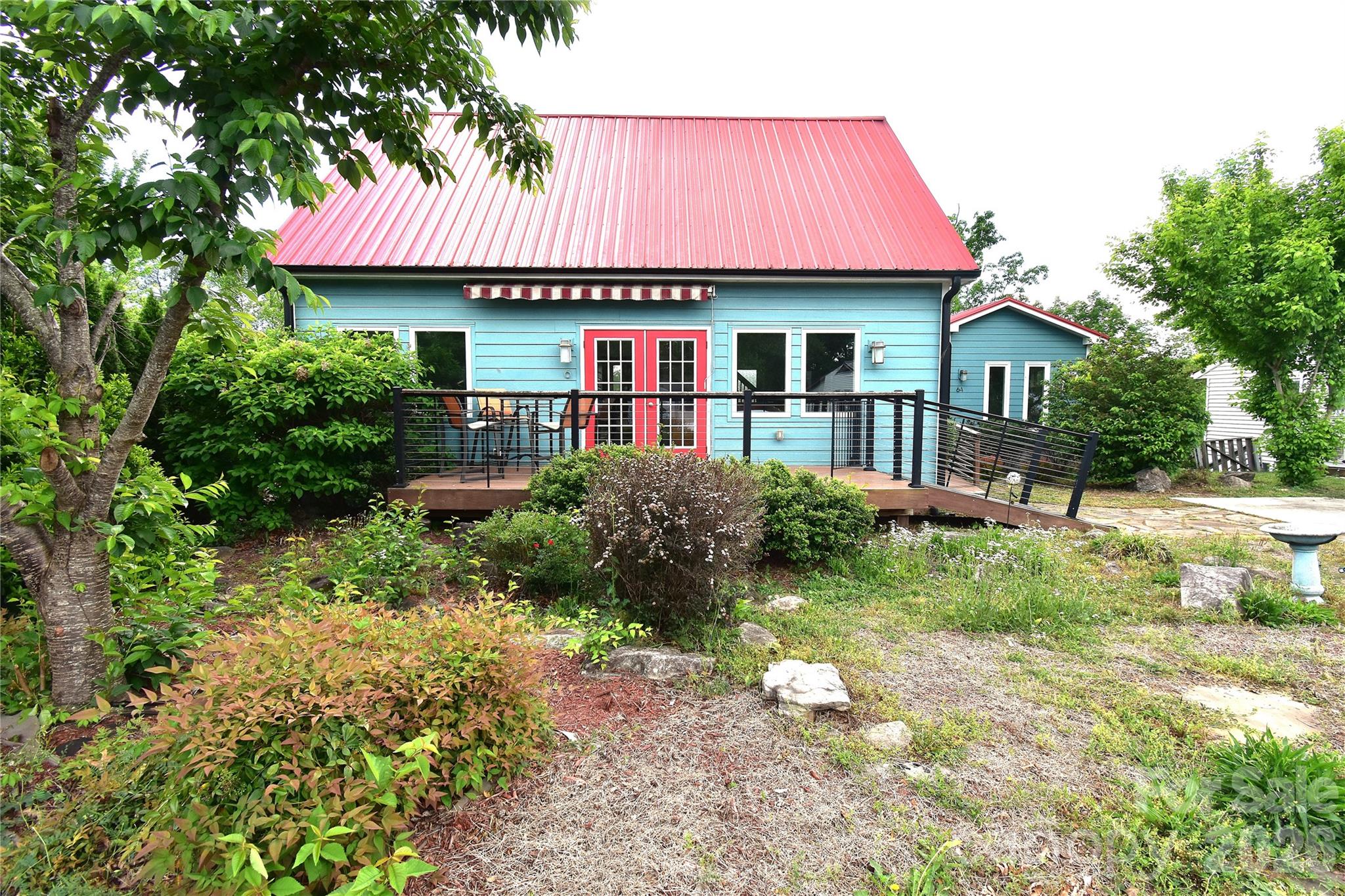6 Belvedere Road Asheville, NC 28803 - Photo 19 of 33 a front view of a house with garden