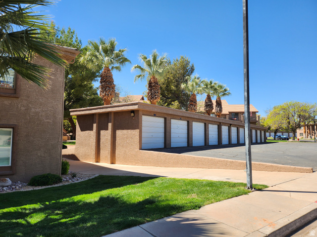 860 South Village Road, Unit Z10 St. George, UT 84770 - Photo 17 of 18 View of building exterior featuring community garages