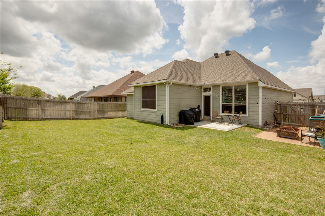 2120 Markley Drive Bryan, TX 77807 - Photo 21 of 21 a view of a house with pool and chairs next to yard