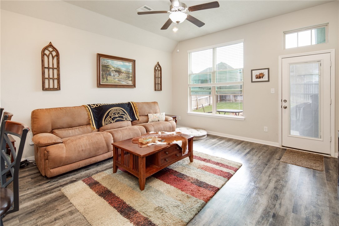 2120 Markley Drive Bryan, TX 77807 - Photo 4 of 21 a living room with furniture a rug and a window
