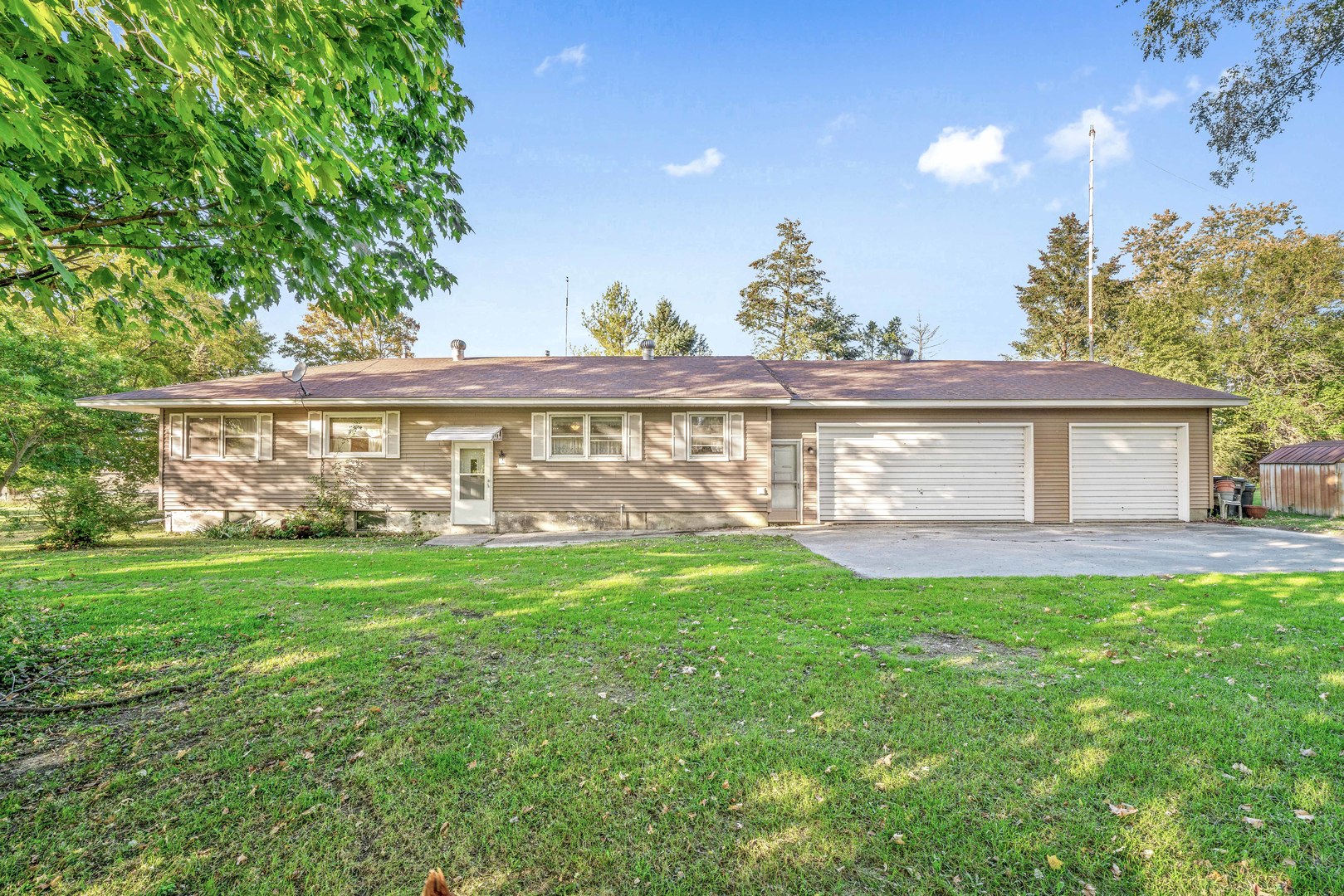 6N731 County Line Road Maple Park, IL 60151 - Photo 1 of 17 a view of a house with a backyard
