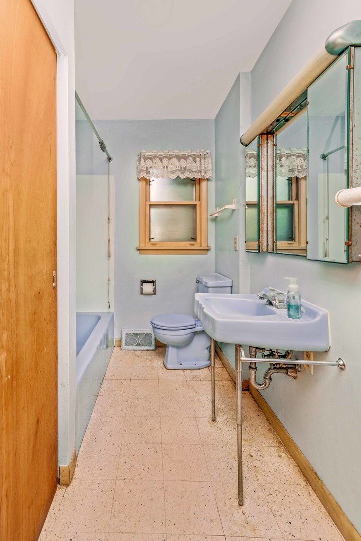 6N731 County Line Road Maple Park, IL 60151 - Photo 14 of 17 a bathroom with a sink a toilet and mirror