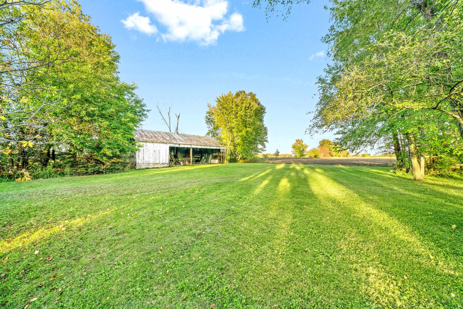 6N731 County Line Road Maple Park, IL 60151 - Photo 3 of 17 a view of an house with a backyard