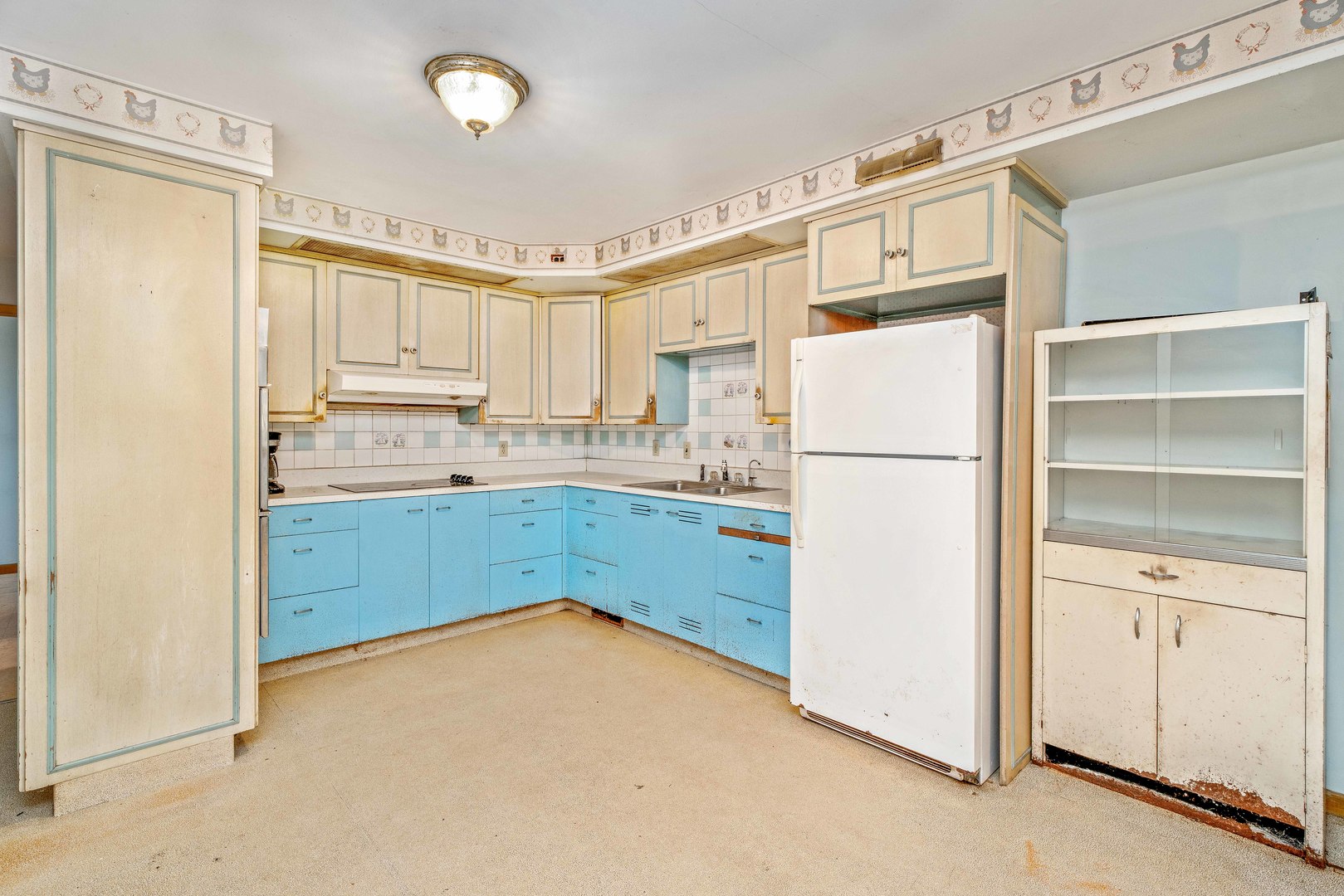 6N731 County Line Road Maple Park, IL 60151 - Photo 8 of 17 a kitchen with a refrigerator a stove top oven and cabinets