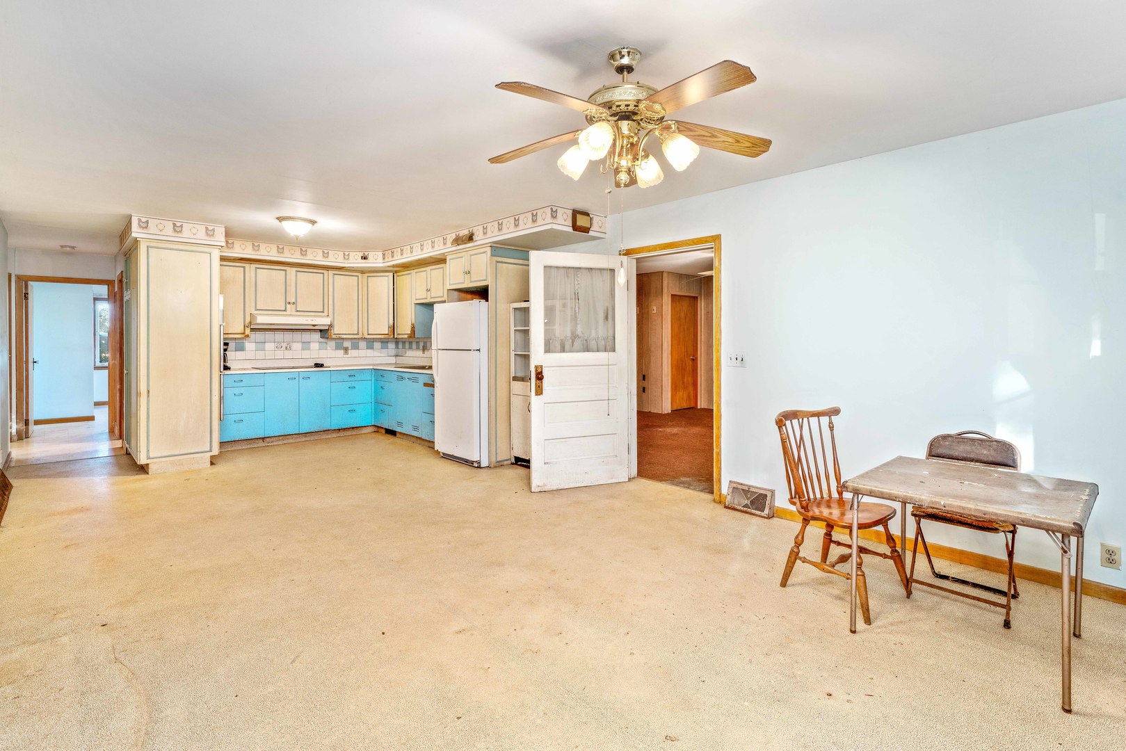 6N731 County Line Road Maple Park, IL 60151 - Photo 9 of 17 a view of a livingroom with furniture and a chandelier