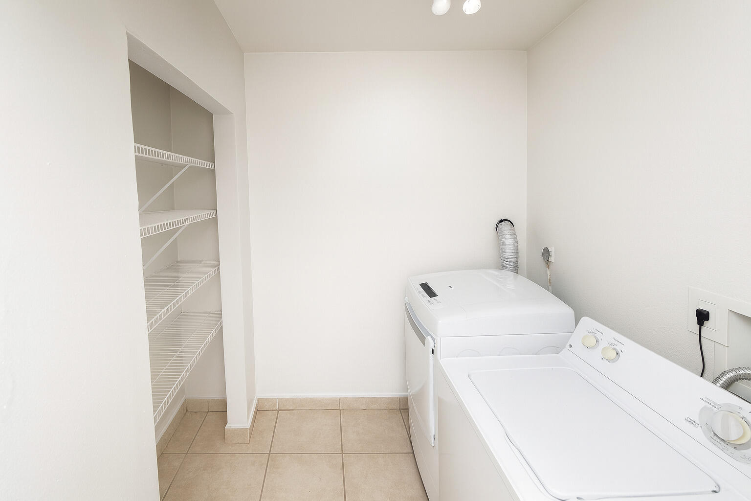 2767 Northwest 58th Terrace Lauderhill, FL 33313 - Photo 8 of 8 a utility room with dryer and washer