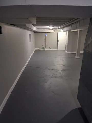 a room with a table and windows