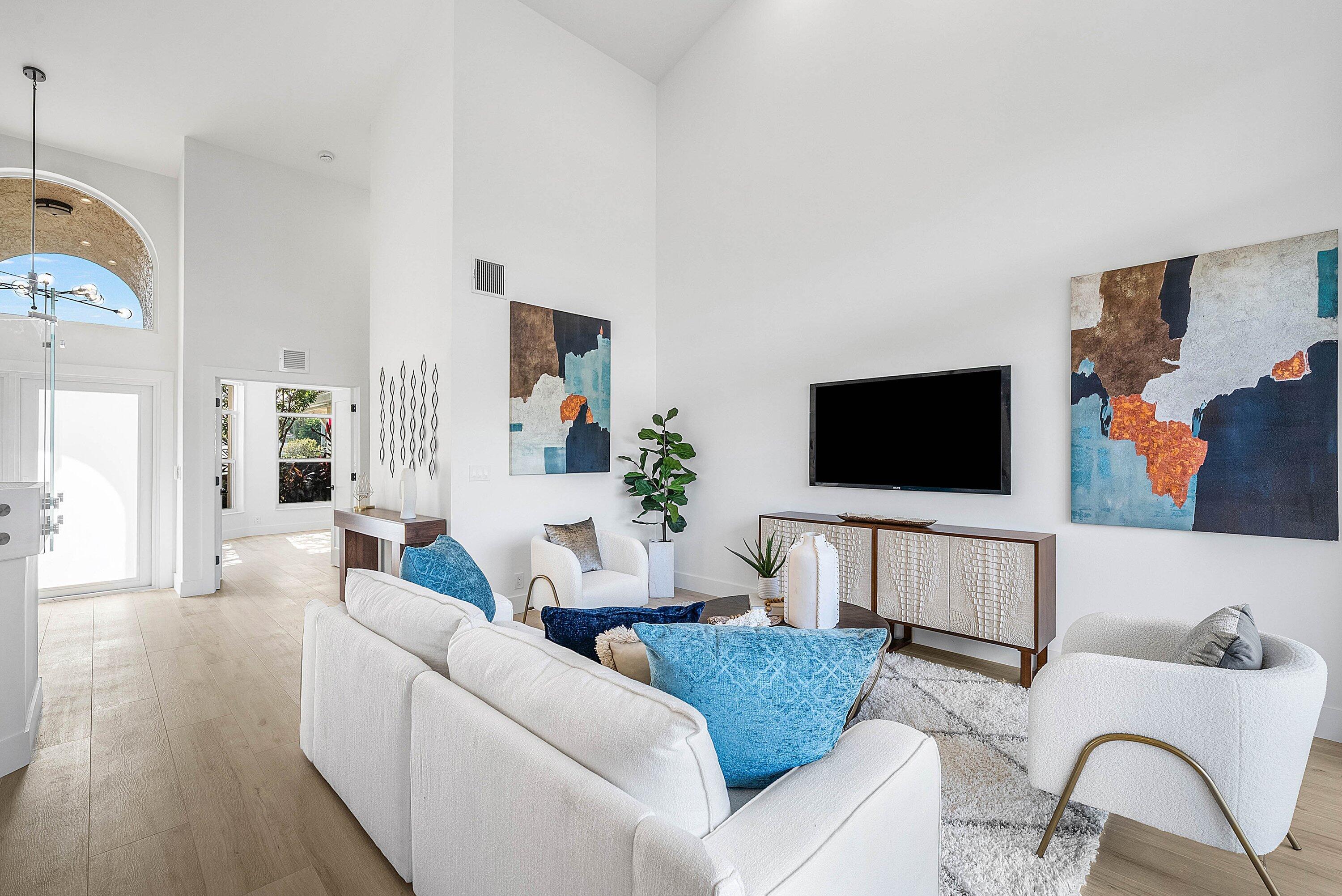 5174 Windsor Parke Drive Boca Raton, FL 33496 - Photo 11 of 55 a living room with furniture and a flat screen tv